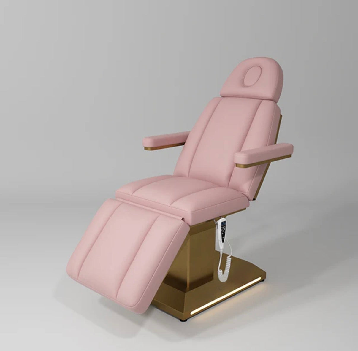 Pink dental chair on a gray background beauty bed salon 